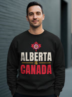 Man wearing black sweatshirt with Alberta is Canada text and maple leaf design.
