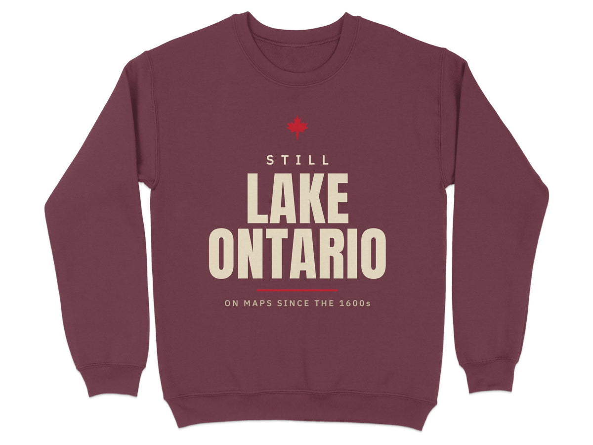 Maroon sweatshirt with "STILL LAKE ONTARIO ON MAPS SINCE THE 1600s" text.