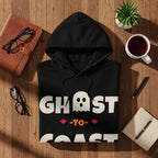 Black hoodie with "Ghost -TO-" text and ghost graphic.