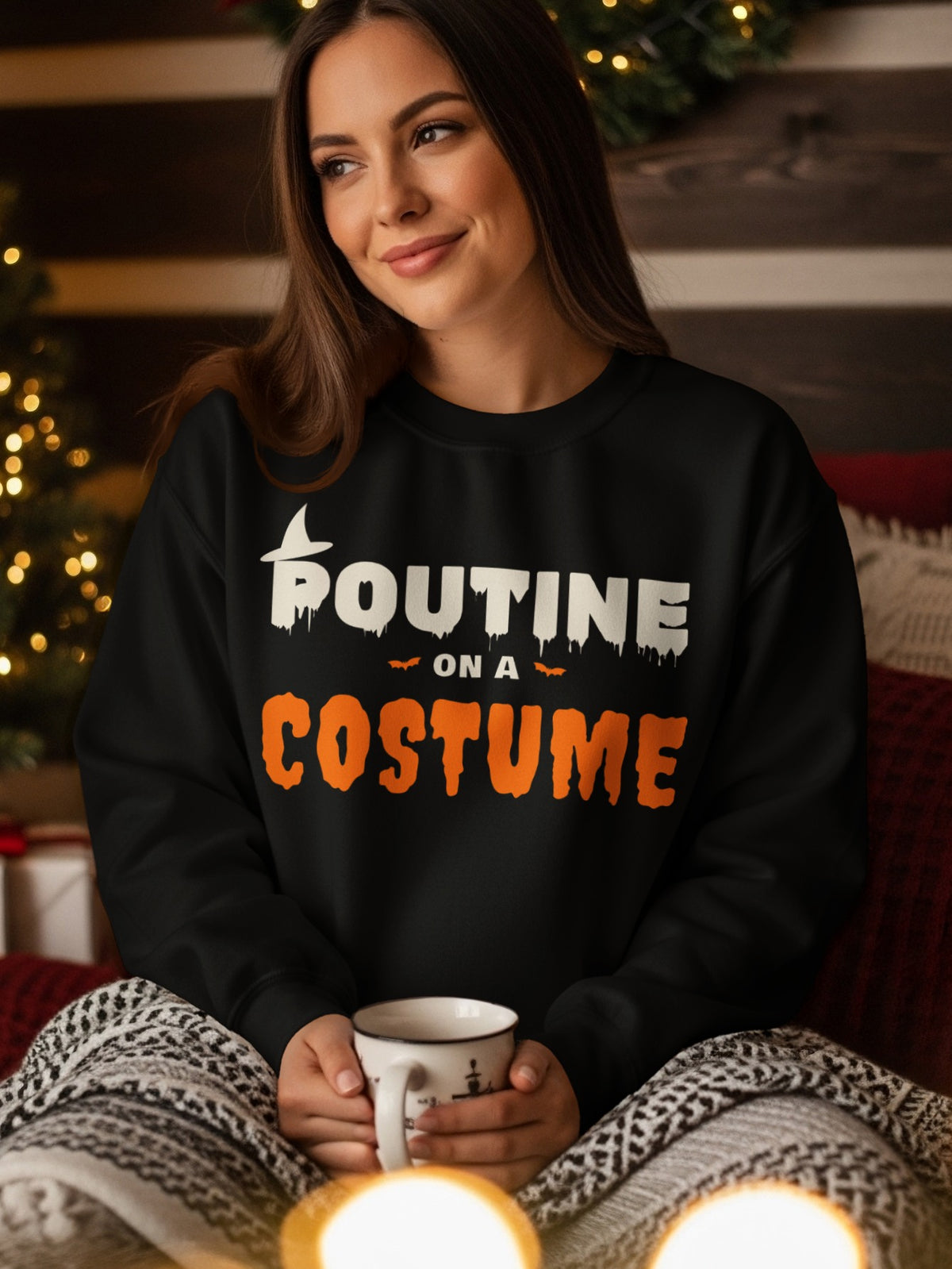 Black sweatshirt with white text "POUTINE" and orange text "ON A COSTUME".