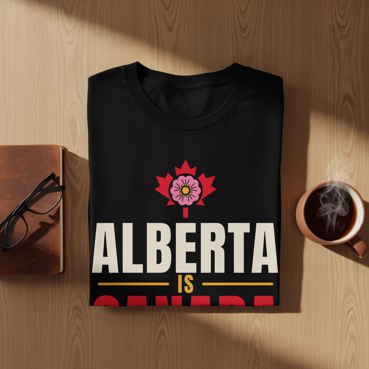 Black t-shirt with "Alberta Is Canada" text and maple leaf logo.
