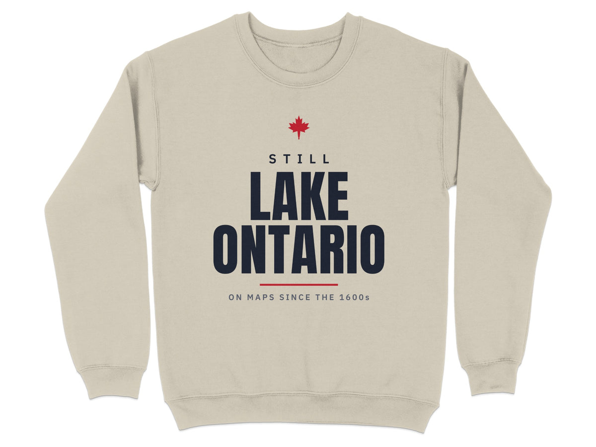 Light tan sweatshirt with "Still Lake Ontario" and "On Maps Since The 1600s" text.