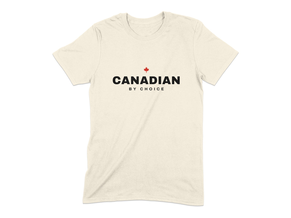 Cream t-shirt with black text "CANADIAN BY CHOICE" and a red maple leaf.