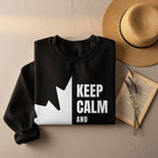 Black sweatshirt with white maple leaf and "KEEP CALM AND" text.