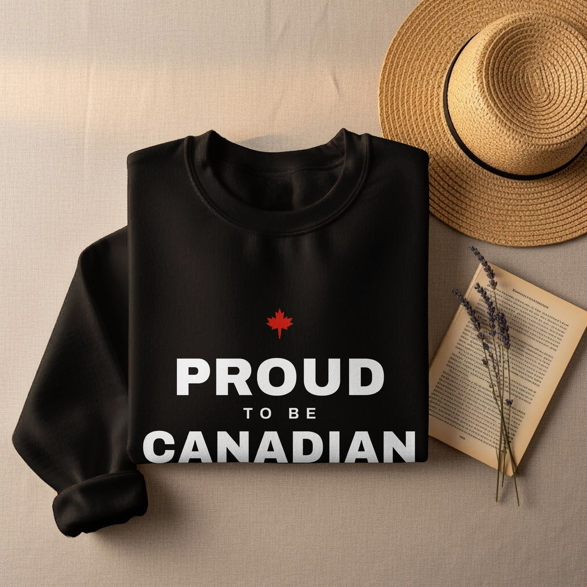 Black sweatshirt with "Proud to be Canadian" text and maple leaf.