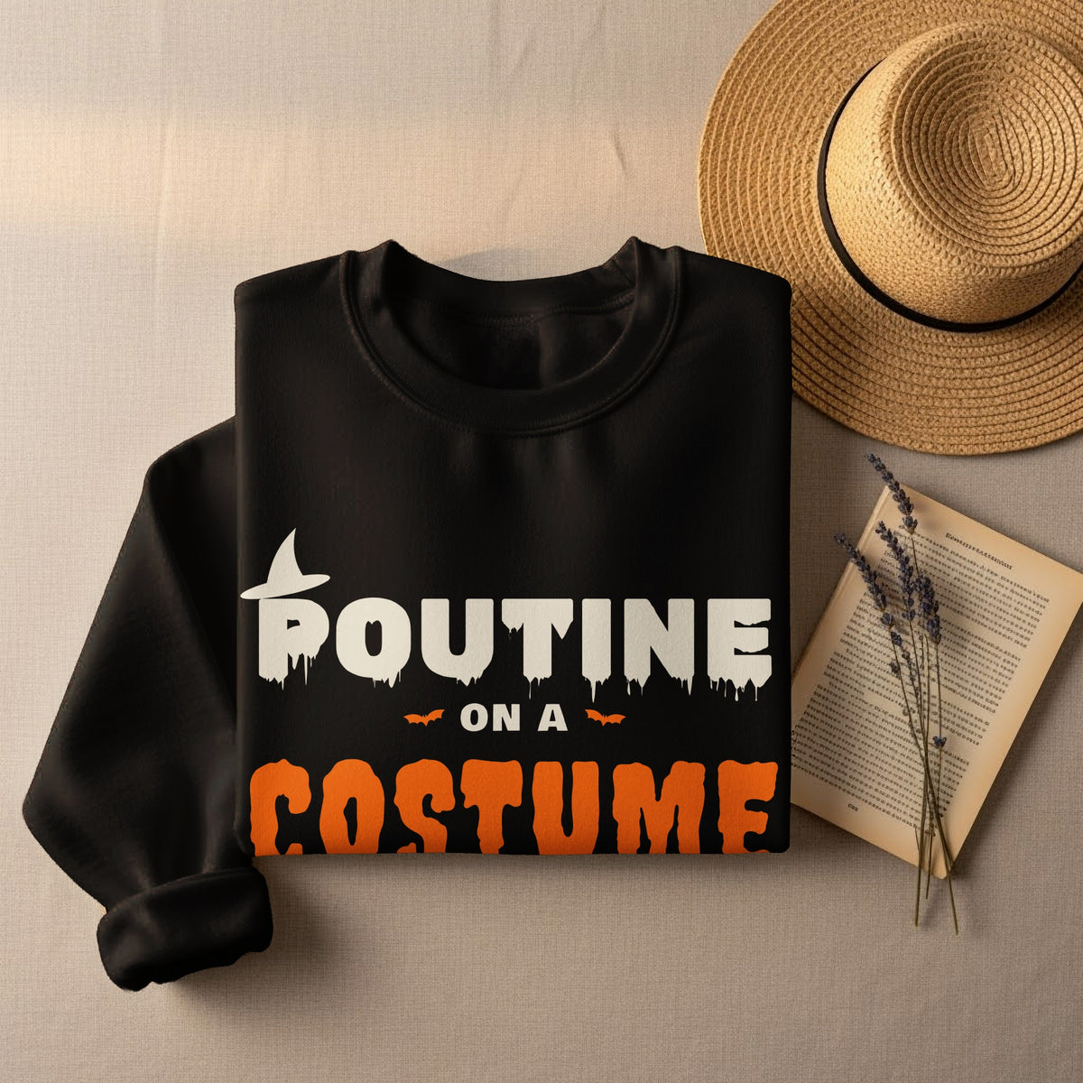 Black sweatshirt with "Poutine on a Costume" Halloween graphic.