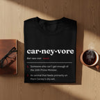 Black t-shirt with "car-ney-vore" definition, a joke about Mark Carney.