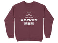 Maroon sweatshirt with "Canadian Hockey Mom" text and crossed hockey sticks graphic.