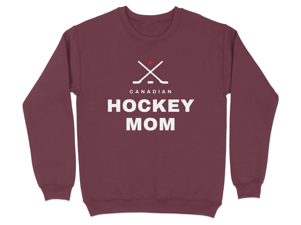 Maroon sweatshirt with "Canadian Hockey Mom" text and crossed hockey sticks graphic.