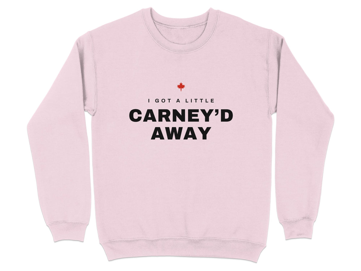 Light pink crewneck sweatshirt with text "I GOT A LITTLE CARNEY'D AWAY" and a red maple leaf.