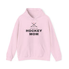 Pink hoodie with crossed hockey sticks and Canadian flag above "HOCKEY MOM" text.