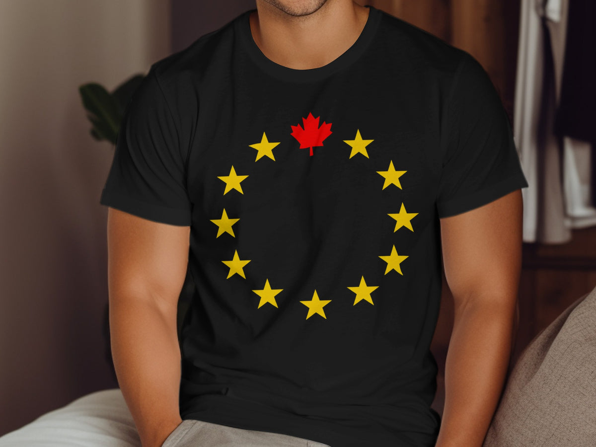 Black t-shirt with yellow stars in a circle and a red maple leaf in the center.
