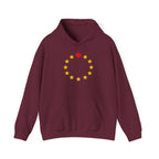 Maroon hoodie with circular design of yellow stars and a red maple leaf.