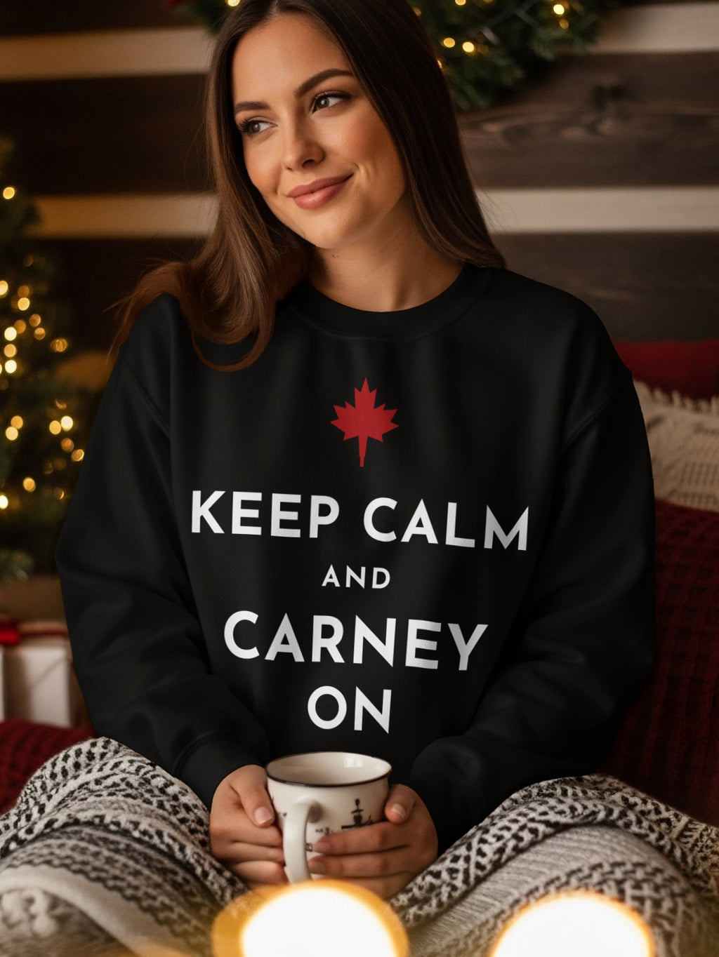 Black sweatshirt with "KEEP CALM AND CARNEY ON" text and a red maple leaf.