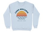 Light blue sweatshirt with "Lake Ontario Great Lakes Canada" text and sunset graphic.