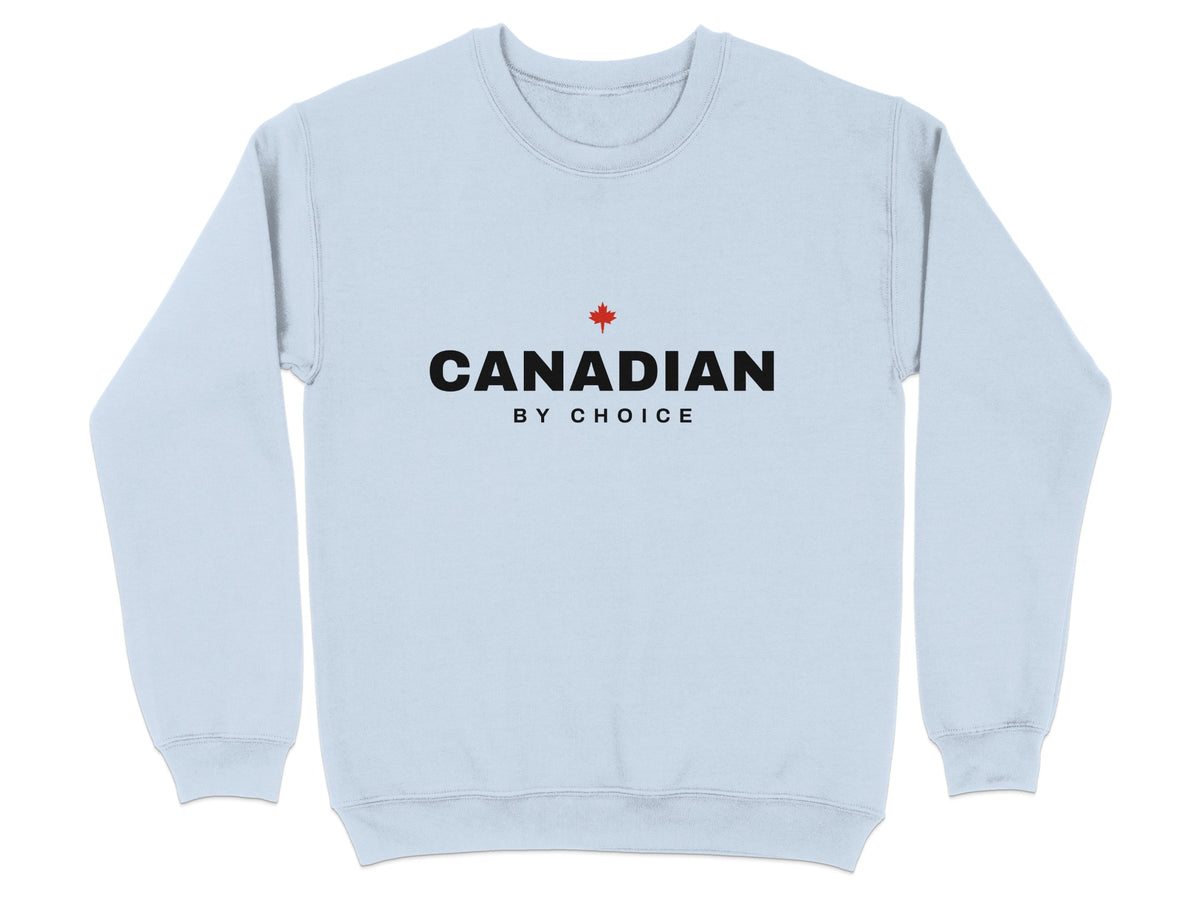 Light blue sweatshirt with black text "CANADIAN BY CHOICE" and a small red maple leaf.