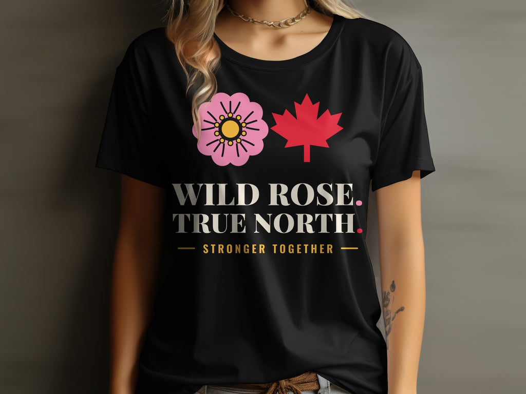 Black t-shirt with a pink wild rose, red maple leaf, and text.