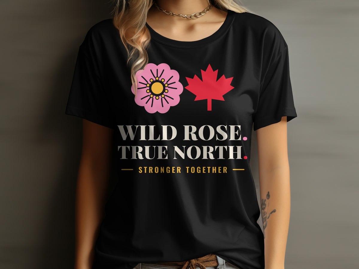 Black t-shirt with a pink wild rose, red maple leaf, and text.