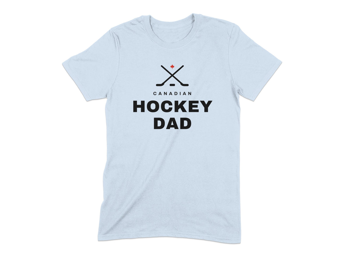 Light blue t-shirt with black text "CANADIAN HOCKEY DAD" and crossed hockey sticks with a Canadian flag.