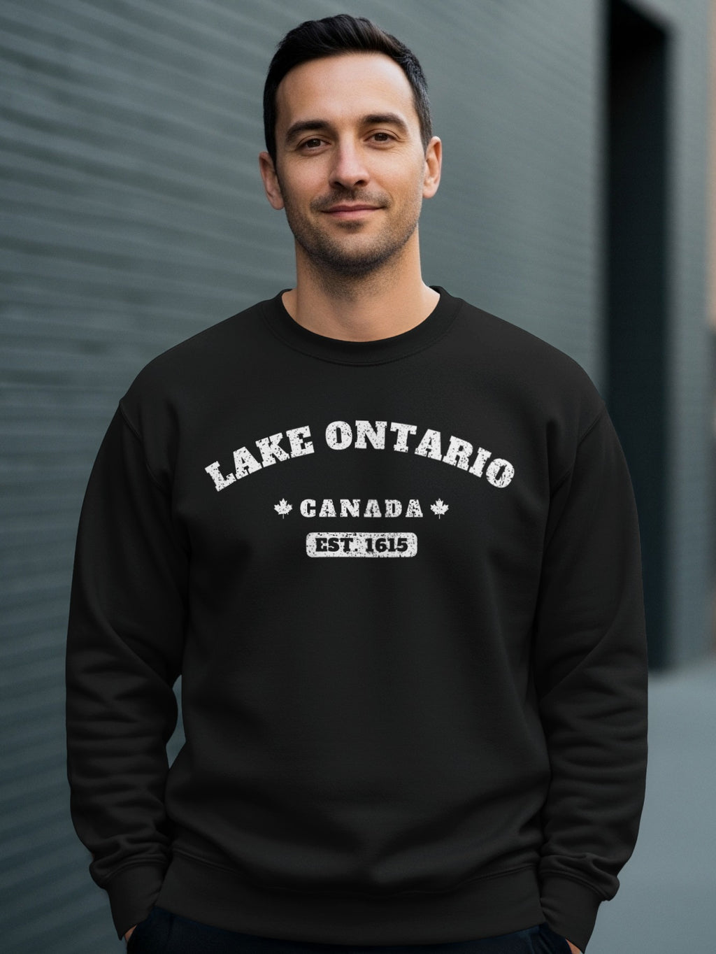 Black sweatshirt with "Lake Ontario Canada Est. 1615" text.