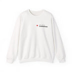 White crewneck sweatshirt with "The Bold Canadian" text and a maple leaf.