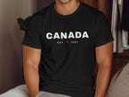 Black t-shirt with "CANADA EST. 1867" and a red maple leaf.