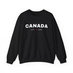 Black sweatshirt with "CANADA EST. 1867" and a red maple leaf.