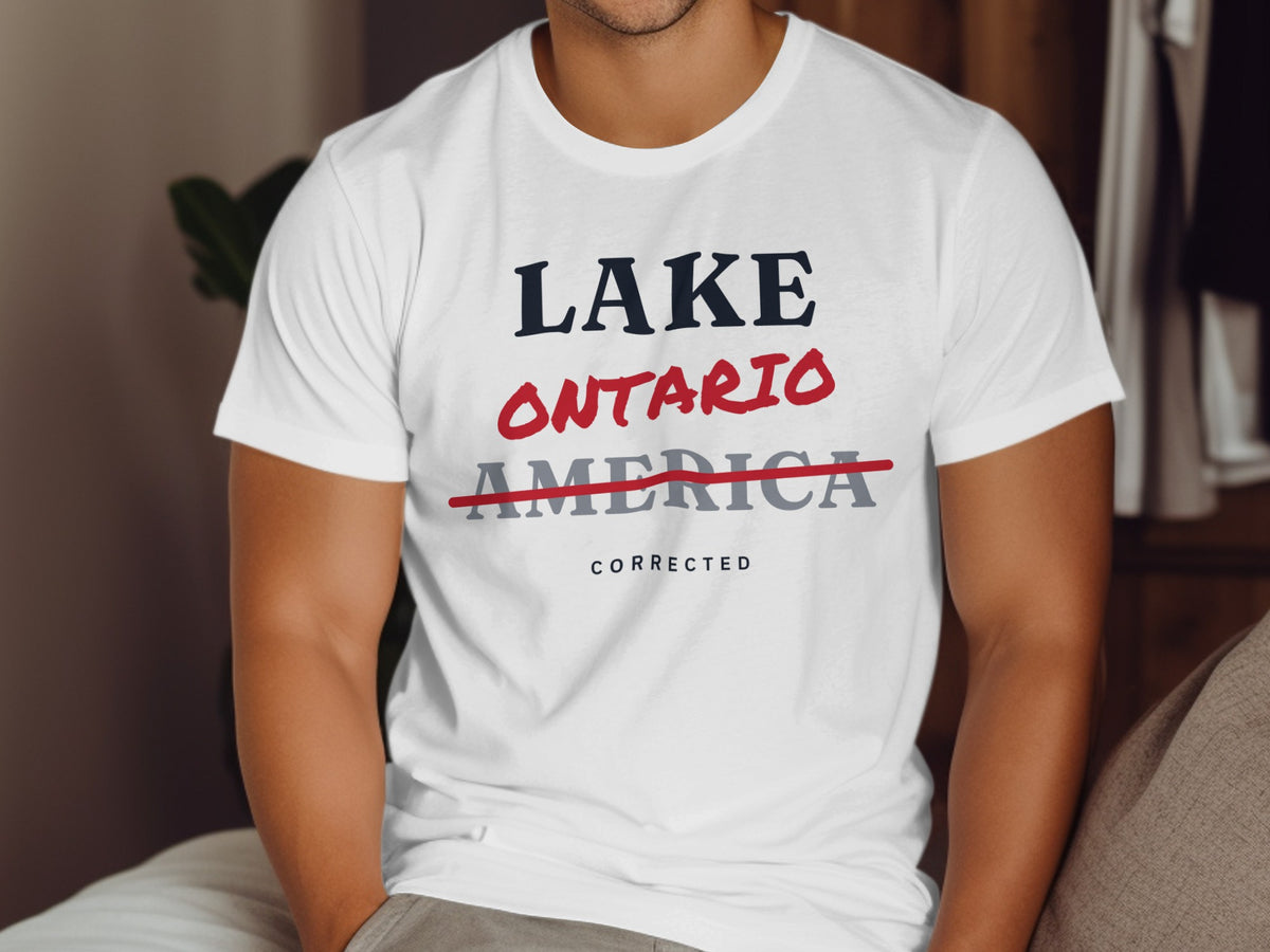 White t-shirt with text "LAKE ONTARIO AMERICA CORRECTED"