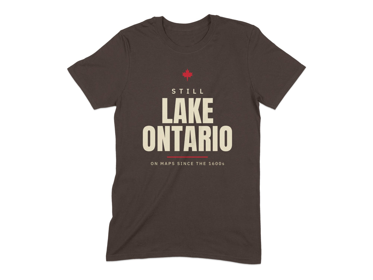 Brown t-shirt with "Still Lake Ontario On Maps Since The 1600s" text and red maple leaf.