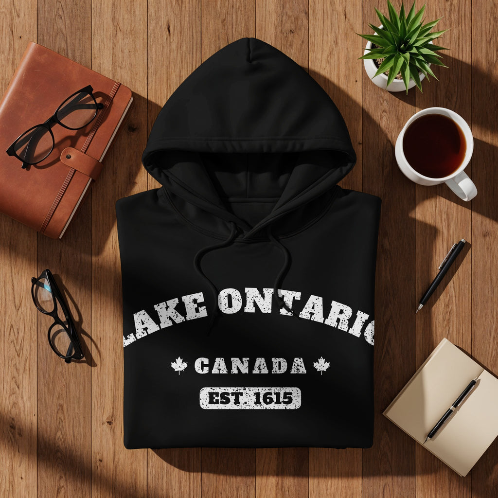 Black hoodie with Lake Ontario, Canada, Est. 1615 text and maple leaves.
