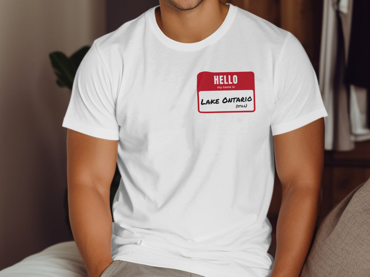 White t-shirt with red "Hello, my name is" tag reading "Lake Ontario (Still)".