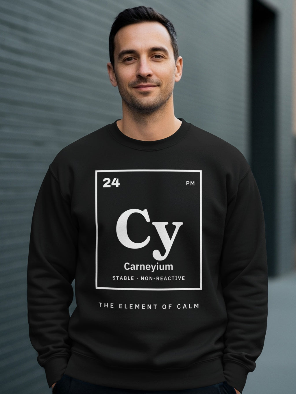 Black sweatshirt with "Carneyium Cy" periodic table element design and "The Element of Calm" text.