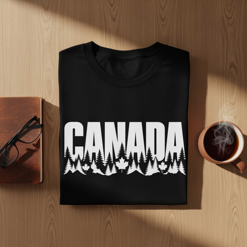 Black t-shirt with white "CANADA" text over a forest and maple leaf graphic.