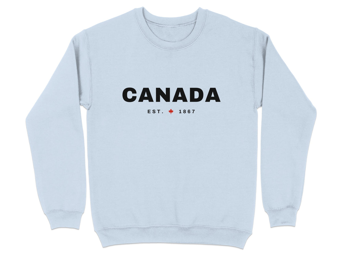 Light blue sweatshirt with black text "CANADA EST. 1867" and a red maple leaf.