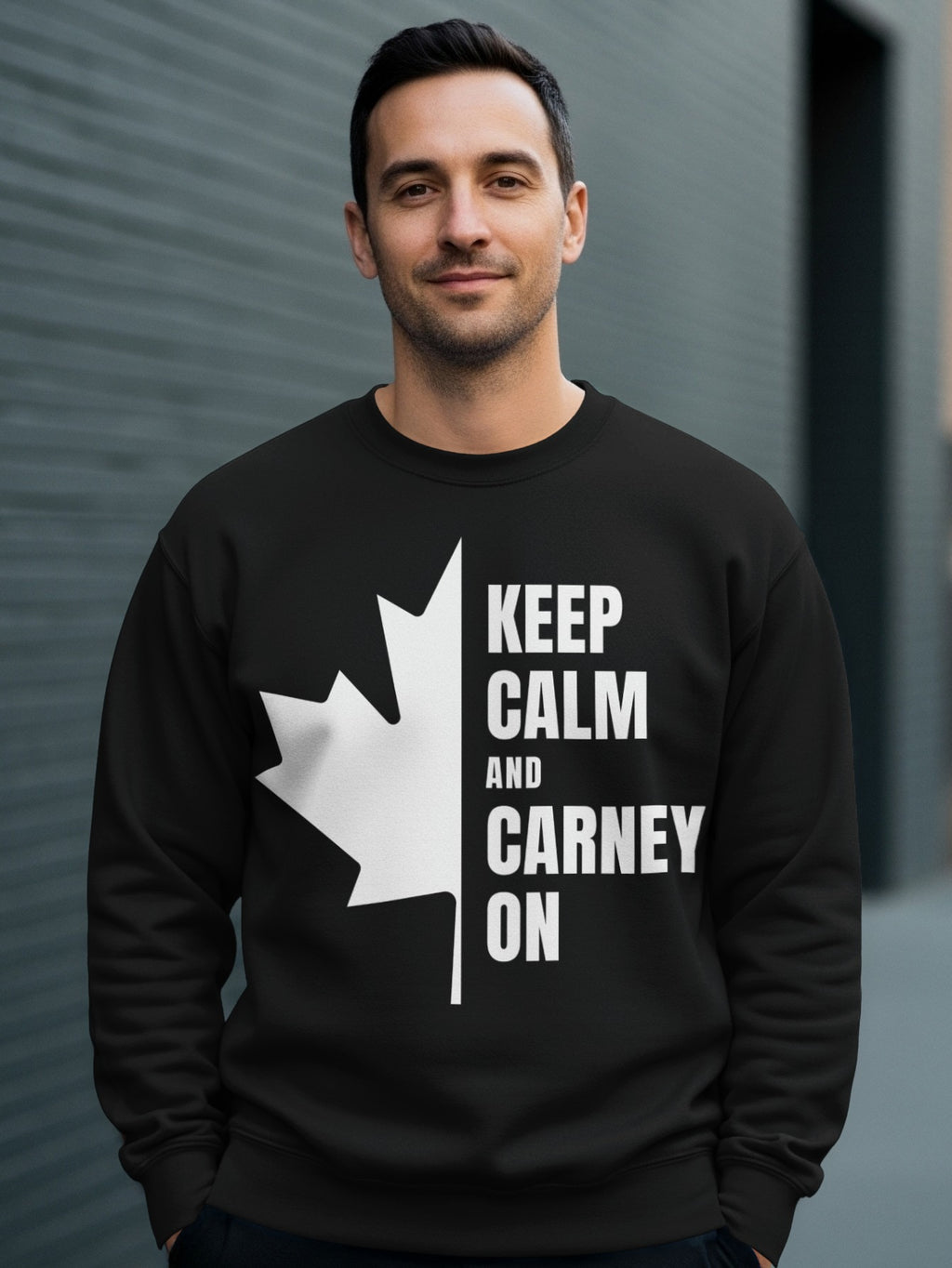 Black sweatshirt with white maple leaf and text "KEEP CALM AND CARNEY ON".
