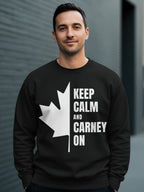 Black sweatshirt with white maple leaf and text "KEEP CALM AND CARNEY ON".
