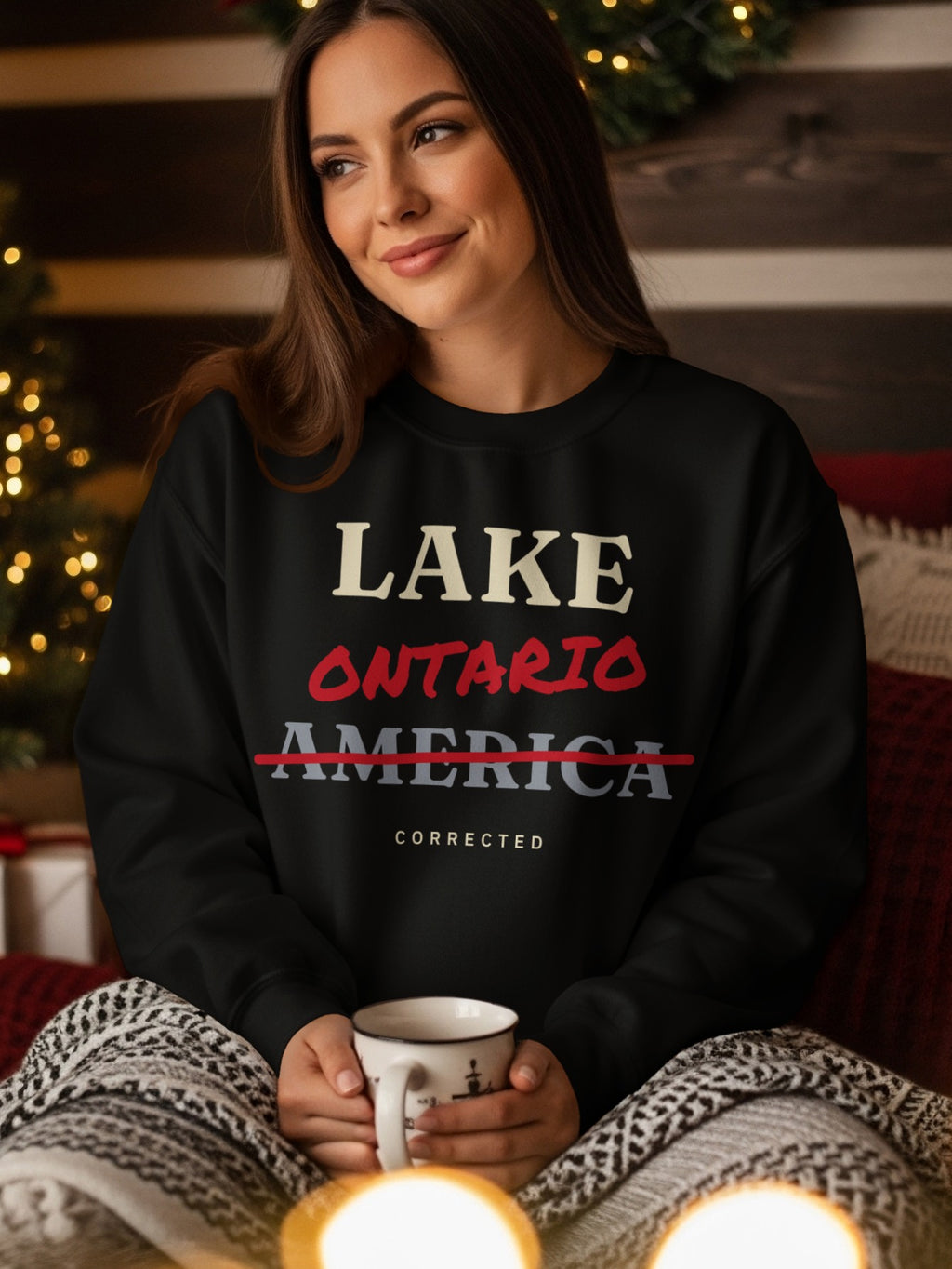 Black sweatshirt with "LAKE ONTARIO AMERICA CORRECTED" text.