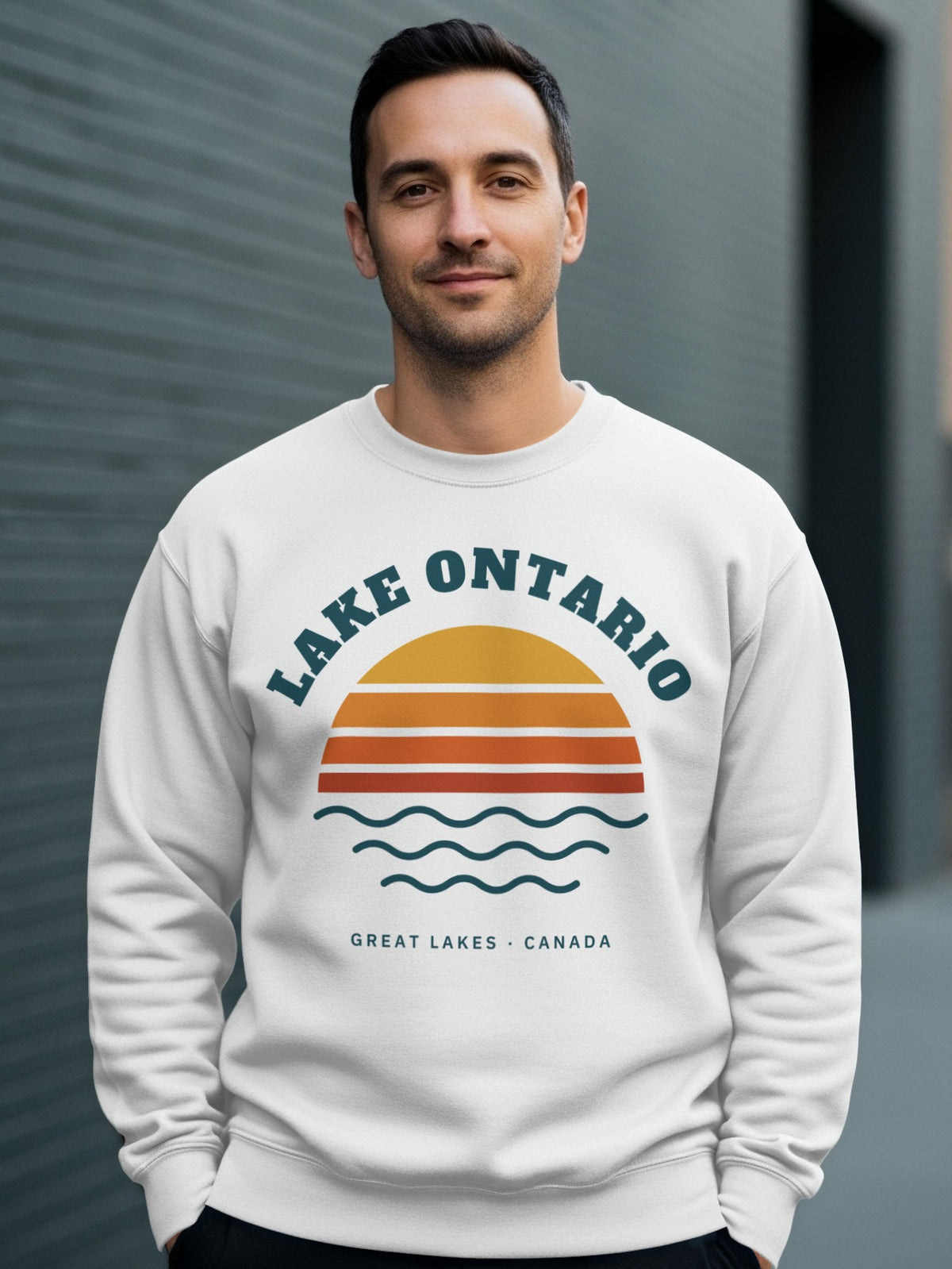 White sweatshirt with "Lake Ontario Great Lakes Canada" text and sunset graphic.