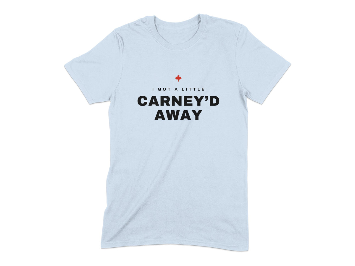 Light blue t-shirt with black text "I GOT A LITTLE CARNEY'D AWAY" and a red maple leaf.