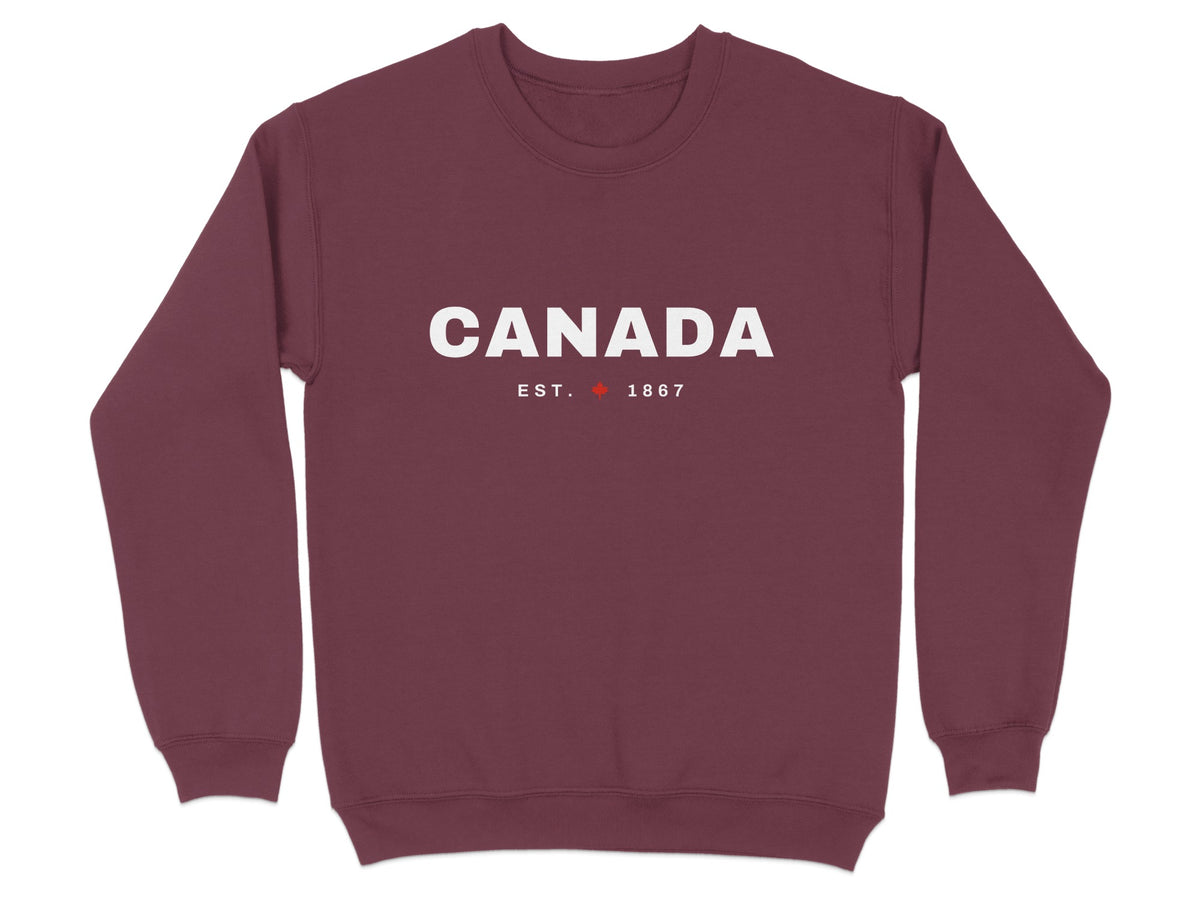 Maroon sweatshirt with "CANADA EST. 1867" and a maple leaf in white text.