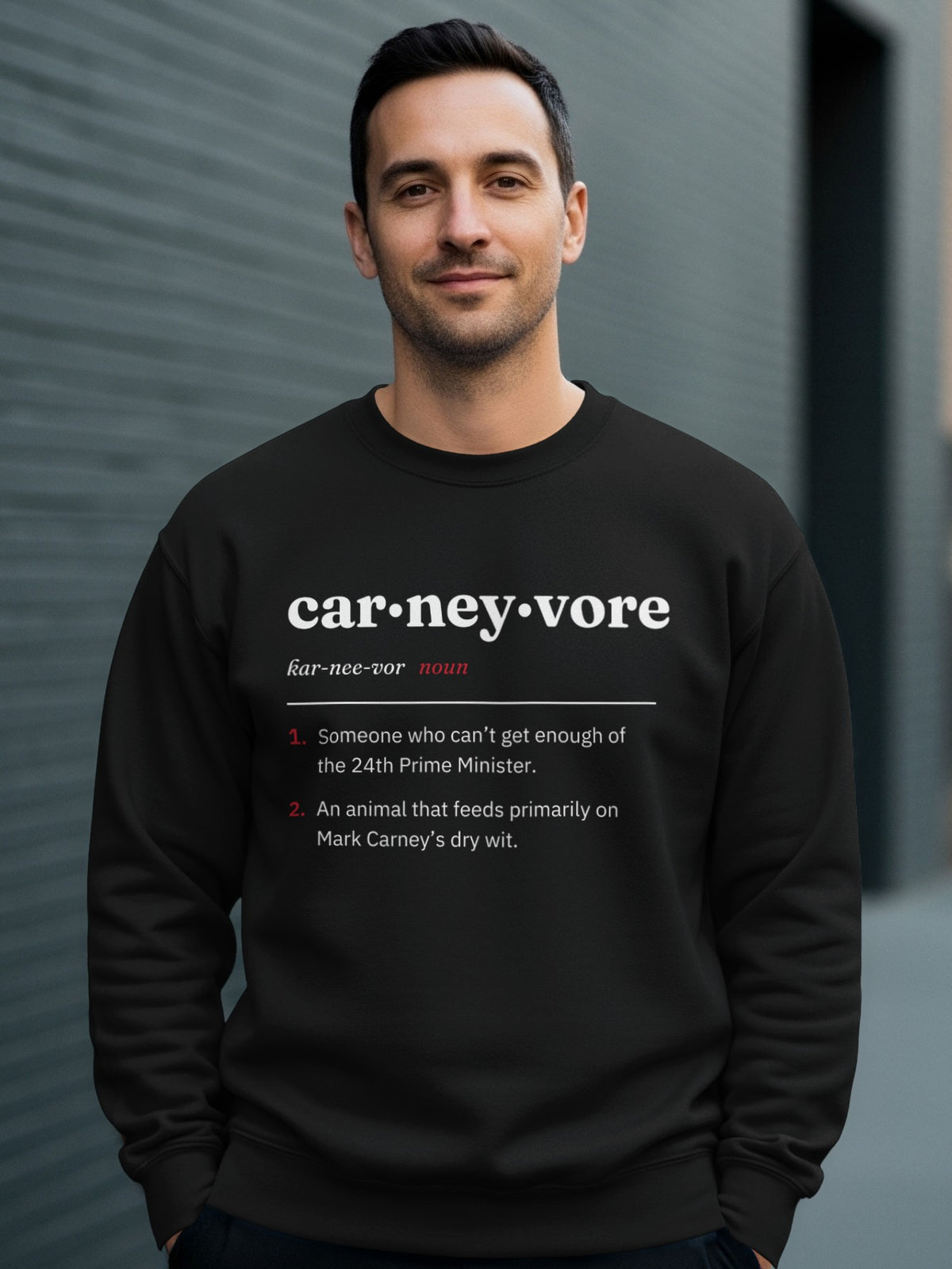 Black sweatshirt with definition of "carneyvore" and two numbered explanations.