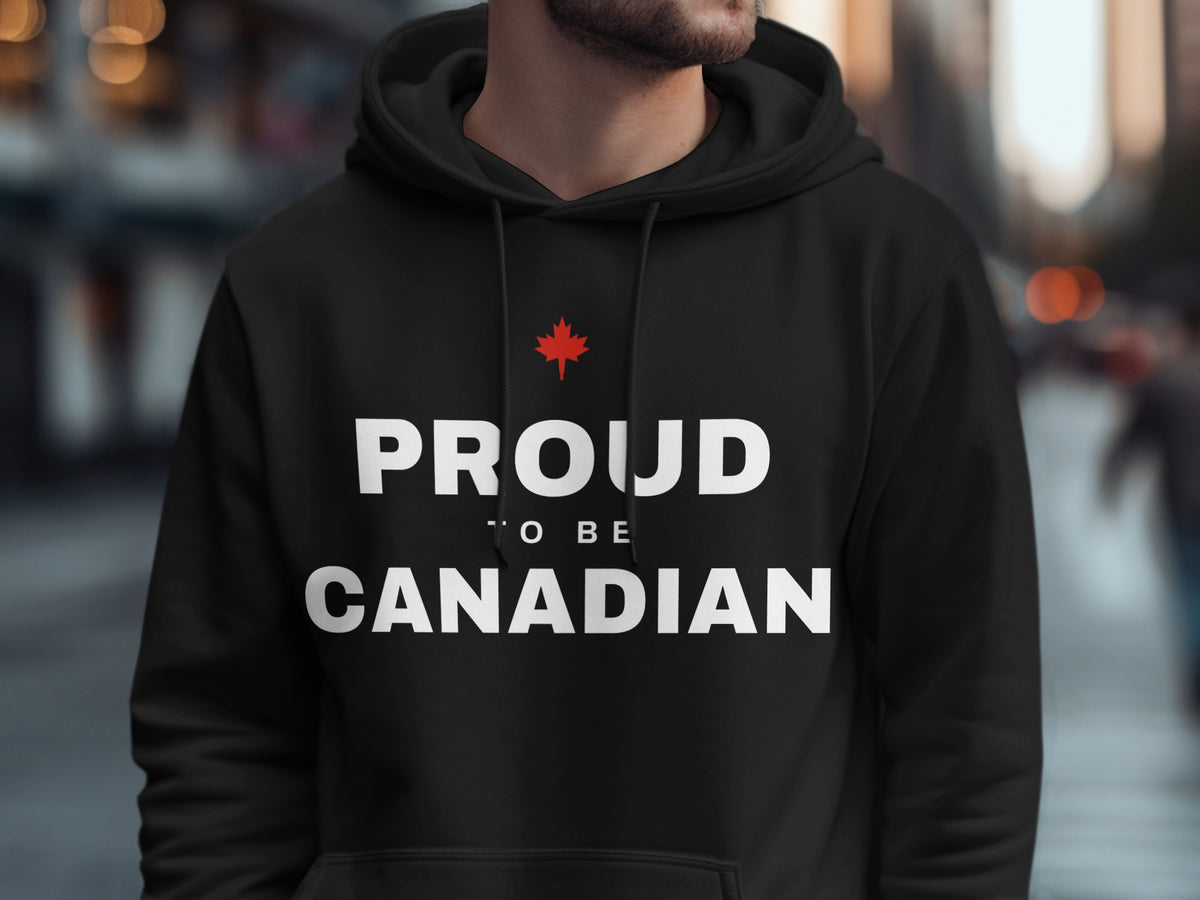 Black hoodie with white text "PROUD TO BE CANADIAN" and a red maple leaf.