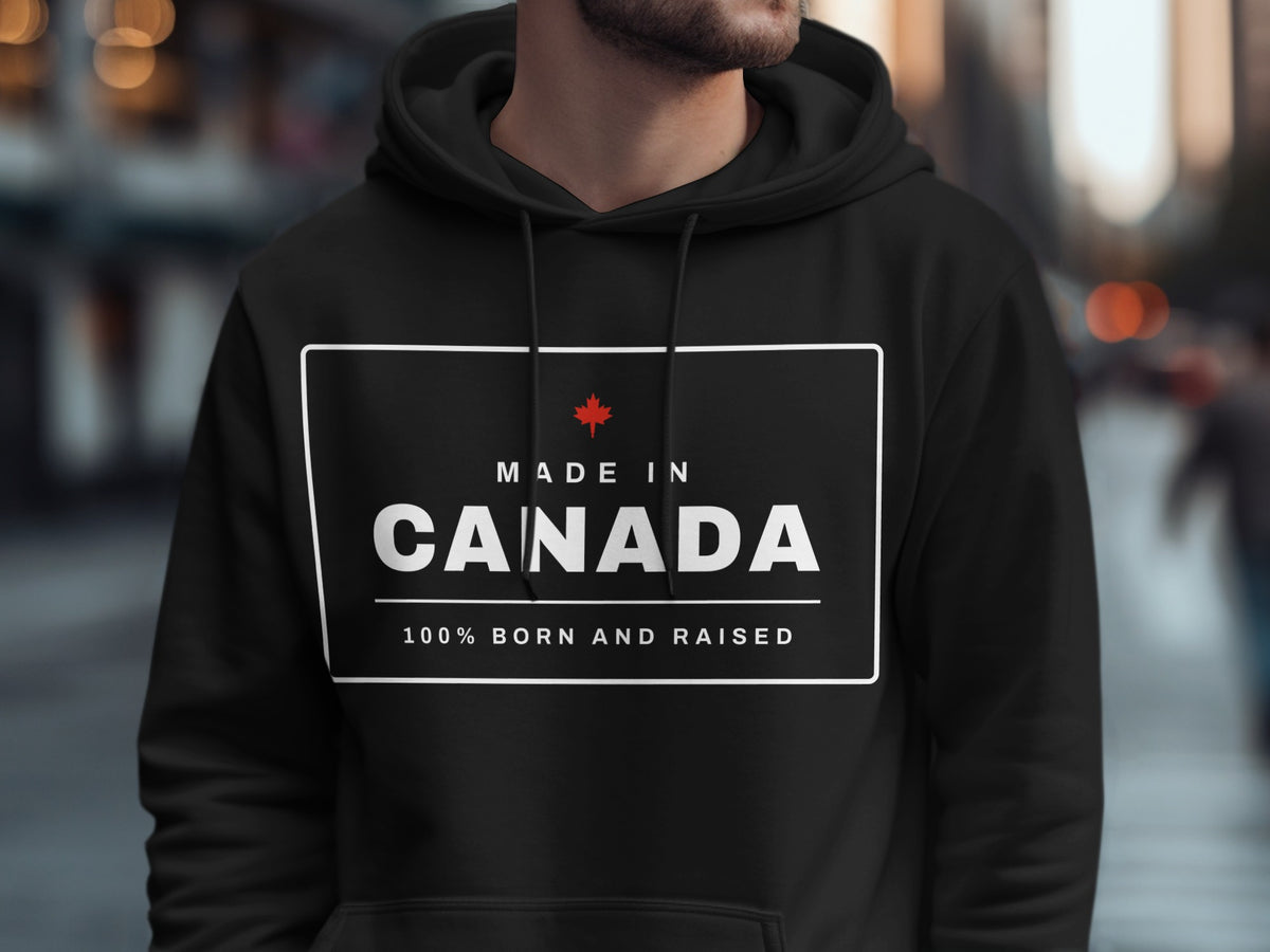 Black hoodie with "Made in Canada" and "100% Born and Raised" text.