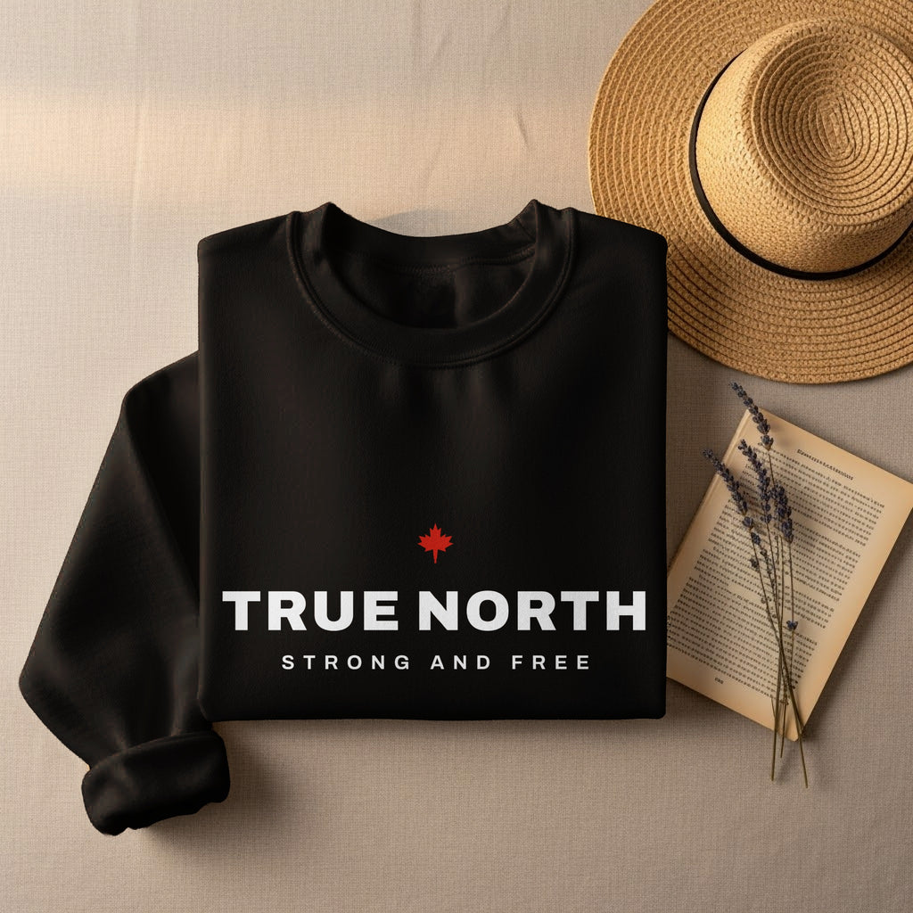 Black sweatshirt with "TRUE NORTH STRONG AND FREE" text and red maple leaf.
