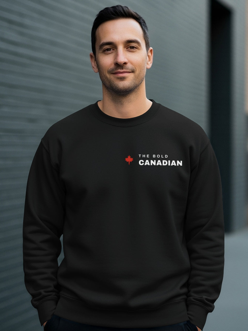 Man wearing a black sweatshirt with "THE BOLD CANADIAN" logo.