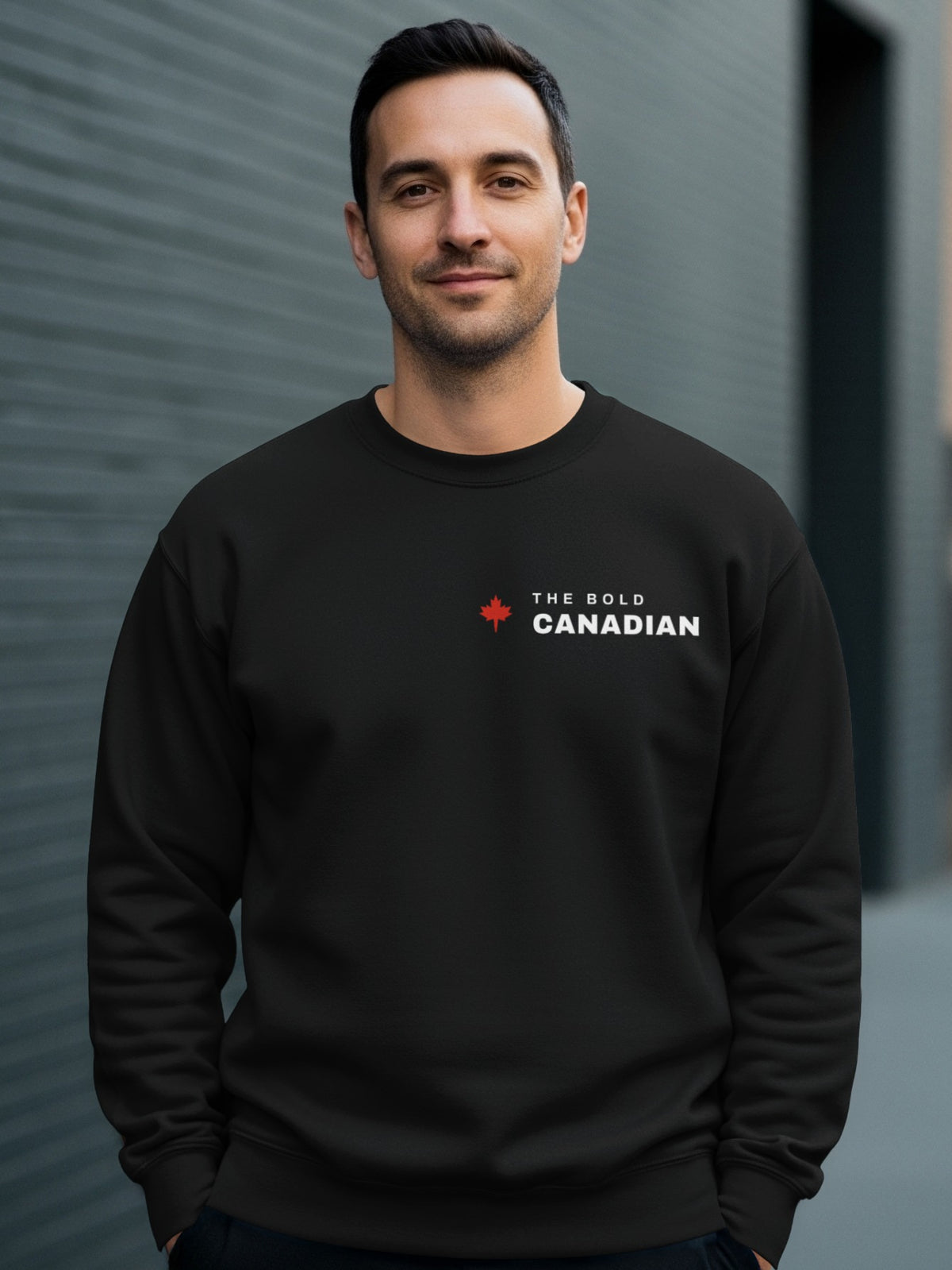 Man wearing a black sweatshirt with "THE BOLD CANADIAN" logo.