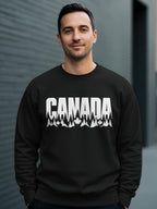 Black crewneck sweatshirt with white "CANADA" text and forest landscape graphic.