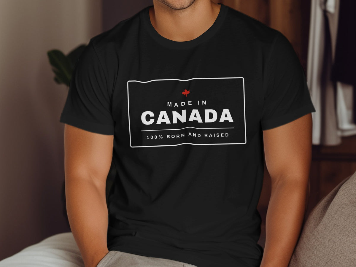 Black t-shirt with "MADE IN CANADA 100% BORN AND RAISED" text and maple leaf.