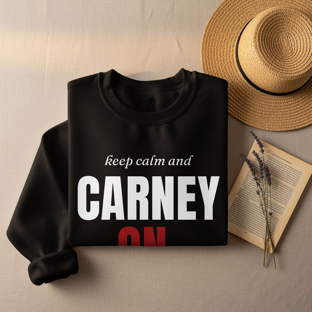Black sweatshirt with "Keep Calm and Carney On" text, straw hat, and dried flowers.