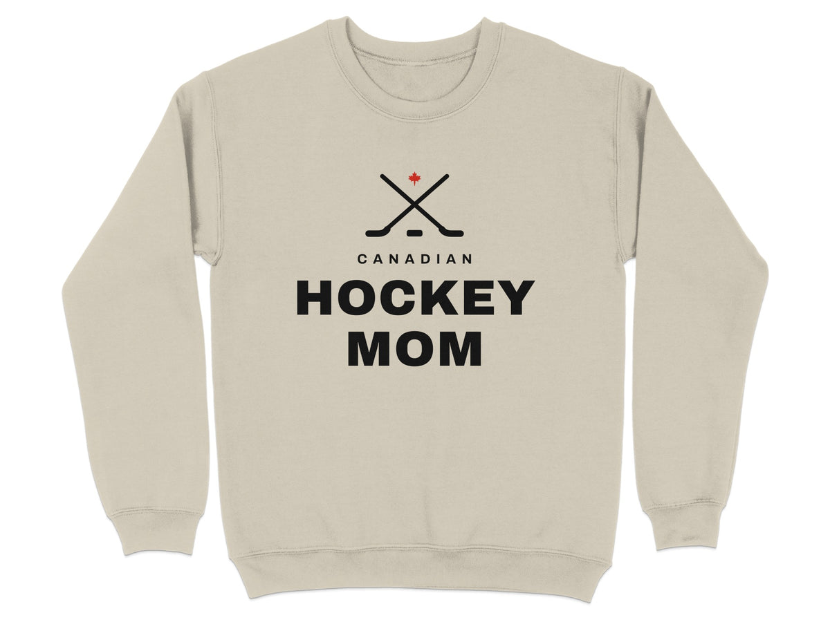 Light beige sweatshirt with "CANADIAN HOCKEY MOM" text and crossed hockey sticks.